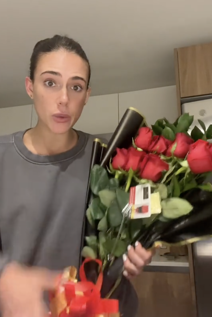 woman holding some roses